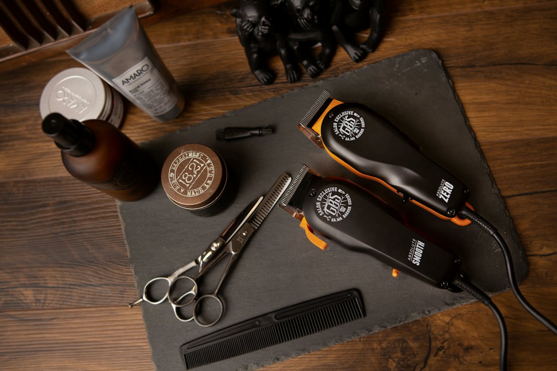 Barber tools on a slate board