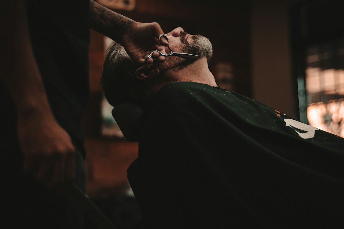 Client relaxing in the barber chair