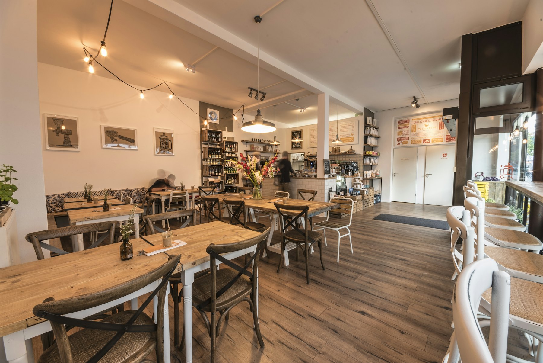 Café interior with wooden tables