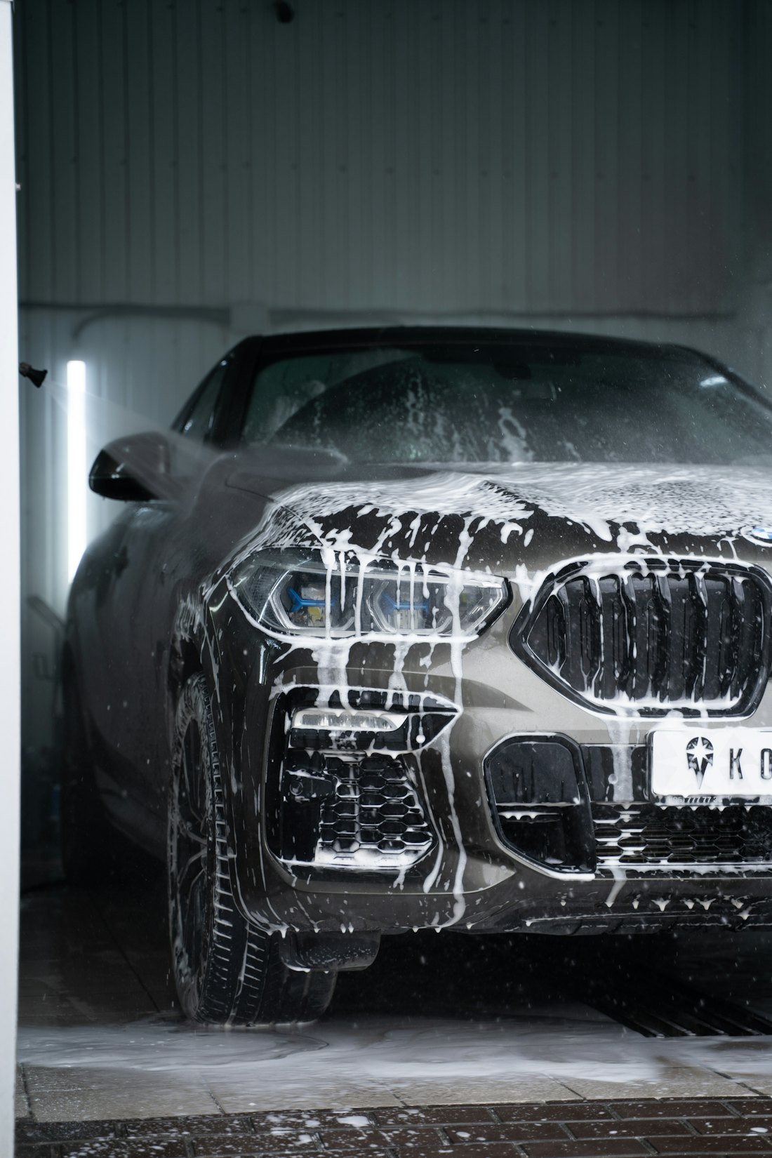 Car covered in snow foam